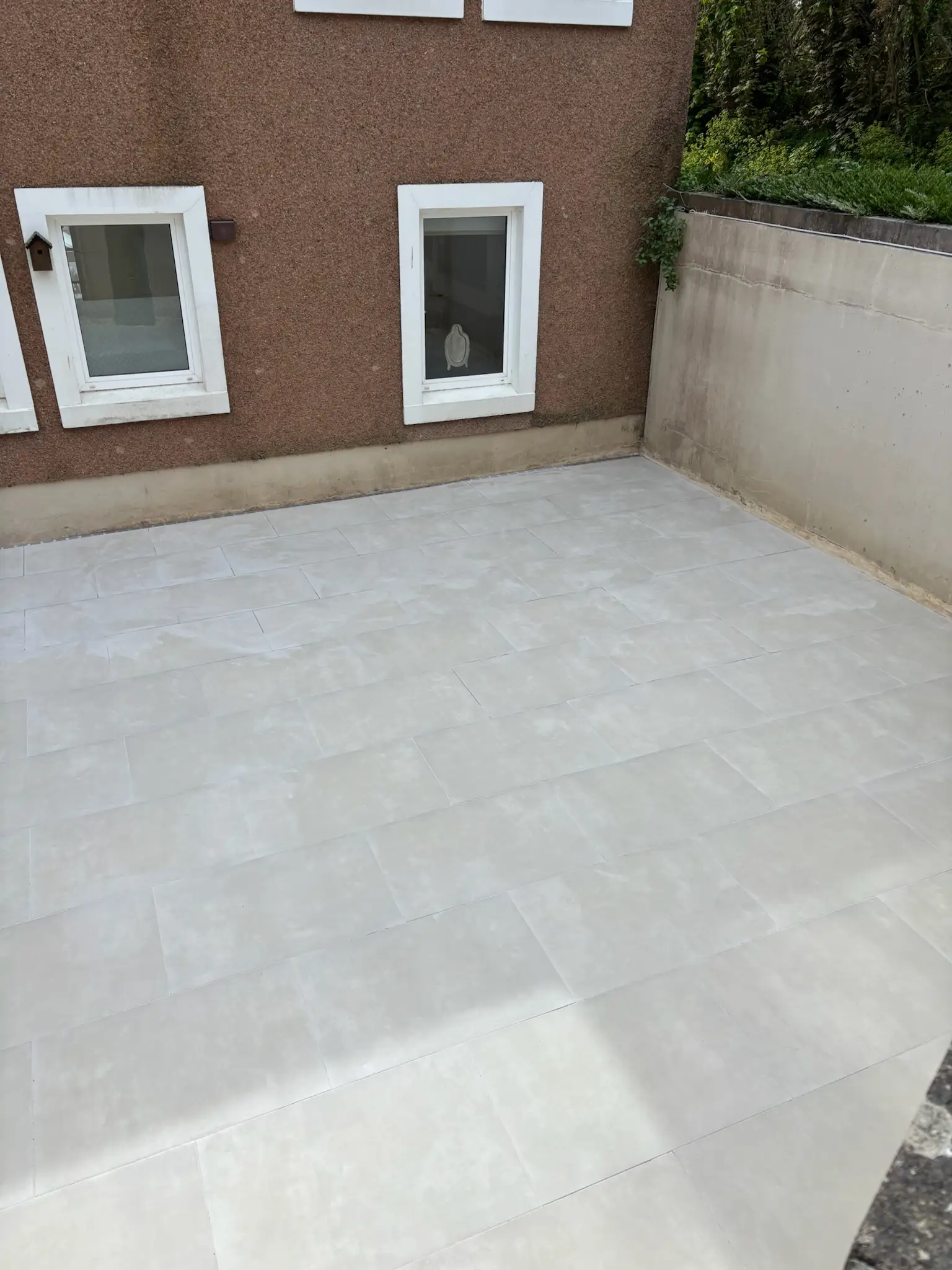 Grouville Courtyard Tiling — after